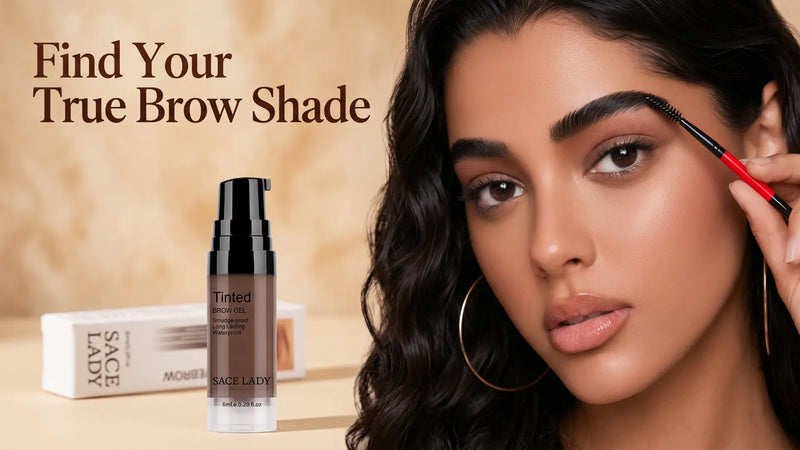 A woman holding a red-handled dual-ended brow brush to her brow, with a clear 6ml tinted brow gel bottle and its box on a cream surface beside her.