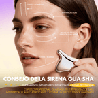 Model using the gua sha-shaped eye serum applicator along facial massage lines